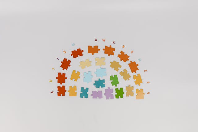 Jigsaw puzzle pieces making a rainbow