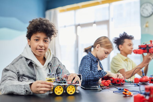 Children using electronic toys.