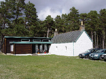 Outside view of Muir Cottage. A white cottage